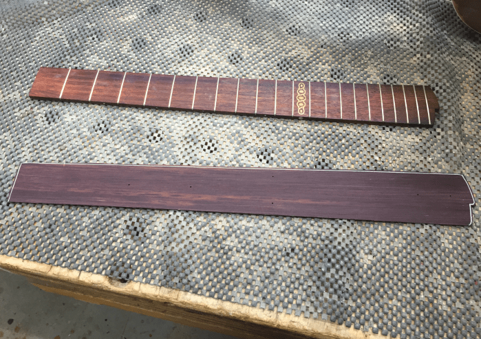 Lining the fingerboard